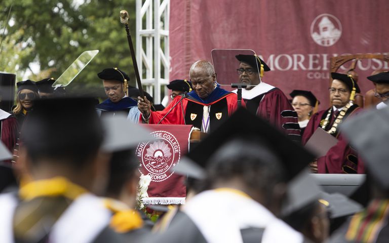 Rev. Dr. Lawrence Edward Carter Sr. delivers the benediction during the Morehouse College commencement ceremony on Sunday, May 21, 2023, on Century Campus in Atlanta. The graduation marked Morehouse College's 139th commencement program. CHRISTINA MATACOTTA FOR THE ATLANTA JOURNAL-CONSTITUTION