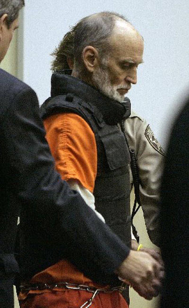 Gary Michael Hilton is led into Dawson County Superior Court in January 2008, where he plead guilty to killing hiker Meredith Emerson.