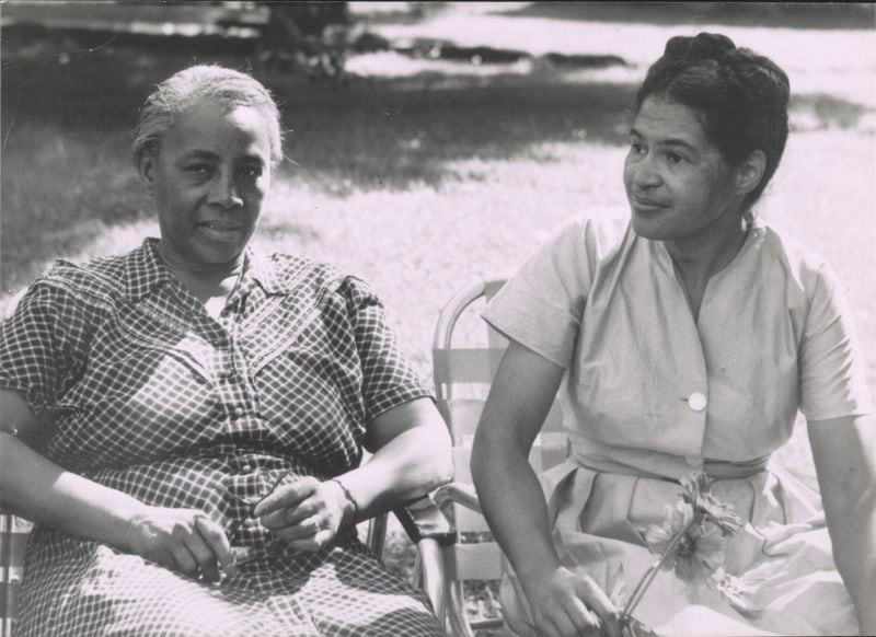 Septima Clark (left) at the Highlander Folk School in Monteagle, Tenn., in 1955. Highlander was an interracial training center for civil rights activists. Clark, an activist from South Carolina, founded the Highlander's Citizenship Schools program, and was a mentor to Rosa Parks (right), who attended workshops at Highlander. (Library of Congress)
