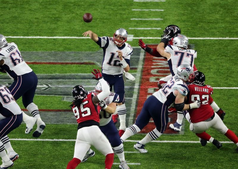 New England Patriots quarterback Tom Brady (12) passes against the Falcons in Super Bowl LI at NRG Stadium in Houston, TX, Sunday,  February 5, 2017. John Spink/AJC