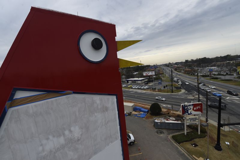 The Big Chicken got a fresh coat of paint Wednesday, March 22, 2017. Marietta's roadside icon at 12 Cobb Parkway is being renovated.