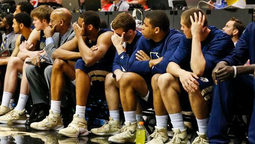 The Georgia Tech bench is sullen as San Diego State expands its lead during the second half in an NCAA college basketball game in the men's NIT on Wednesday, March 23, 2016, in San Diego. (AP Photo/Lenny Ignelzi)