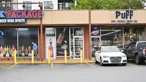 May 12, 2021 Decatur - Puff Smoke Shop is located between the liquor store and clothing alteration store on E. College Ave. in Decatur on Wednesday, May 12, 2021. (Hyosub Shin / Hyosub.Shin@ajc.com)