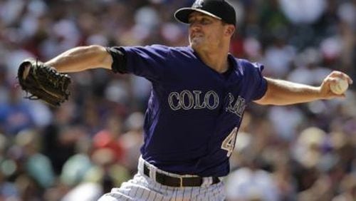 Former Rockies closer Rex Brothers signed a minor league deal with the Braves in February and had his contract purchased Thursday from Triple-A Gwinnett. The left-handed was expected to join the Braves before Thursday night’s series finale against the Padres in San Diego. (AP file photo)