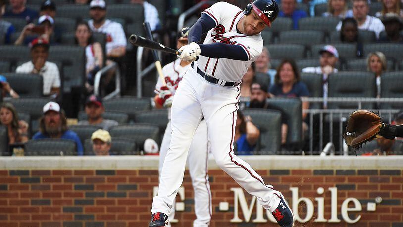 Freddie Freeman of the Braves takes a swing. (Photo by Logan Riely/Getty Images)
