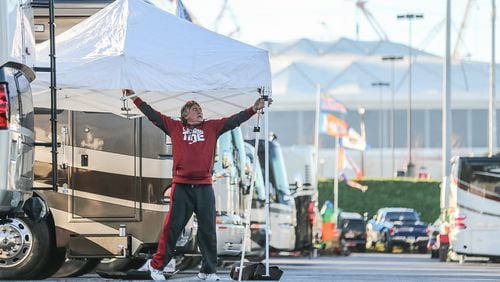 Alabama fan Craig Campbell sets up his RV tent near the Georgia Dome on Fri., Dec. 4, 2015. JOHN SPINK / JSPINK@AJC.COM