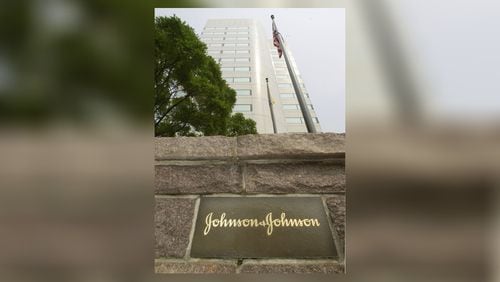 Johnson & Johnson (J&J) corporate headquarters in New Brunswick, N.J. are shown Friday, July 19, 2002. (AP Photo/Daniel Hulshizer)