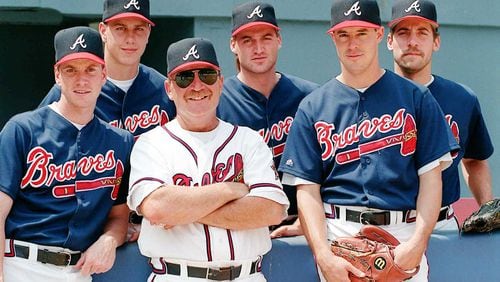 Braves pitching coach Leo Mazzone is surrounded by the Fab Five pitchers (from left) Tom Glavine, Steve Avery, Kent Mercker, Greg Maddux and John Smoltz. His job of pitching coach was made easier by the formidable starting rotation. (AJC file photo)