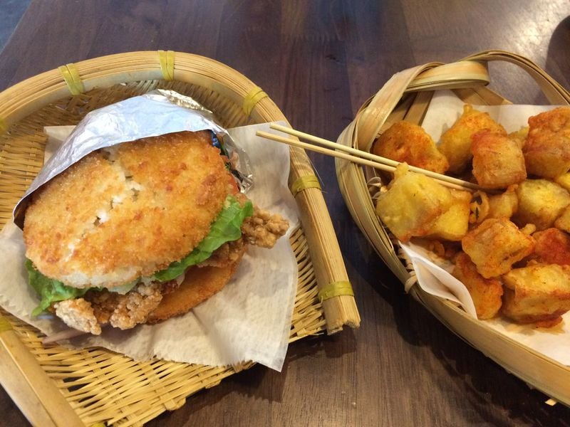 A crispy chicken Rice Burger and an order of fried oyster mushrooms at Tea House Formosa combine the flavors of Taiwan with the thrift of American fast food. CONTRIBUTED BY WENDELL BROCK