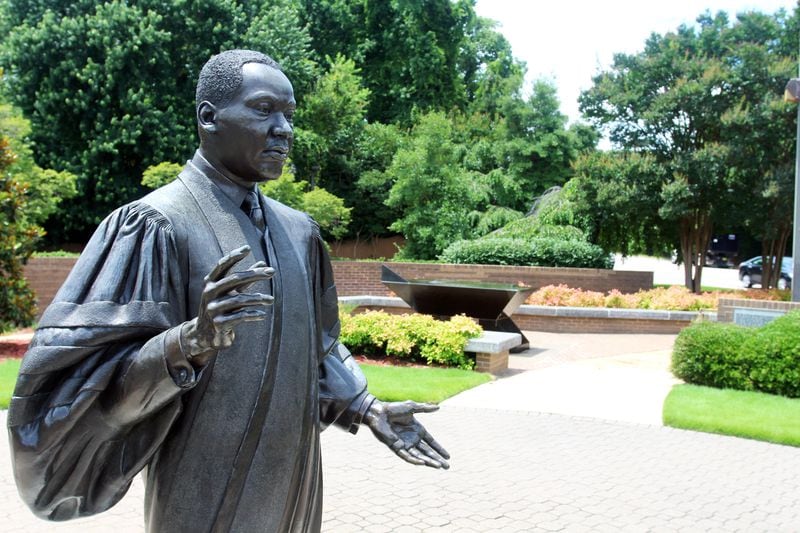 A life-sized statue in Raleigh’s MLK Memorial Gardens. (Colin Campbell / The News & Observer)