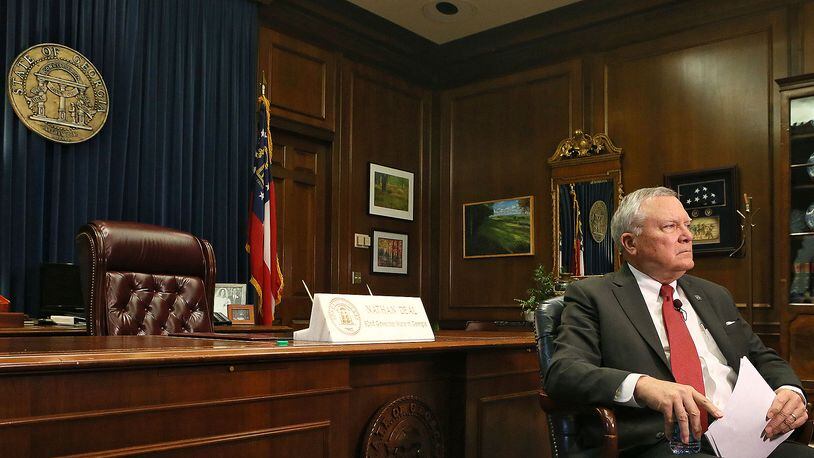 Governor Nathan Deal, shown during a January interview at the State Capitol, has been considering major changes to Georgia's Division of Family and Children Services after two metro Atlanta children and reports in the AJC that mistakes by DFCS workers contributed to at least 25 deaths in 2012. The governor now plans to restructure the agency, sources tell the AJC.