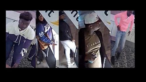 Gwinnett County police are looking for four men suspected of stealing more than $20,000 in iPhones from a Sprint kiosk at the Mall of Georgia.