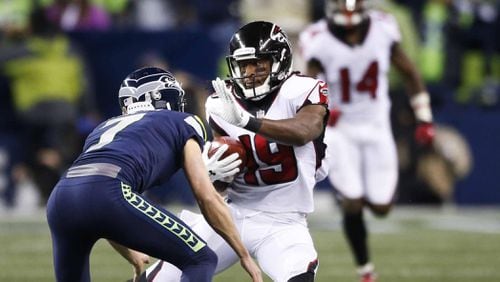 SEATTLE, WA - NOVEMBER 20: Kicker Blair Walsh #7 of the Seattle Seahawks tries to block wide receiver Andre Roberts #19 of the Atlanta Falcons on the opening kickoff in the first quarter of the game at CenturyLink Field on November 20, 2017 in Seattle, Washington.  (Photo by Otto Greule Jr /Getty Images)