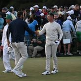 Scottie Scheffler shakes hands with Rory McIlroy at the end of their second round of the 2024 Masters Tournament at Augusta National Golf Club, Friday, April 12, 2024, in Augusta, Ga. (Hyosub Shin / Hyosub.Shin@ajc.com)
