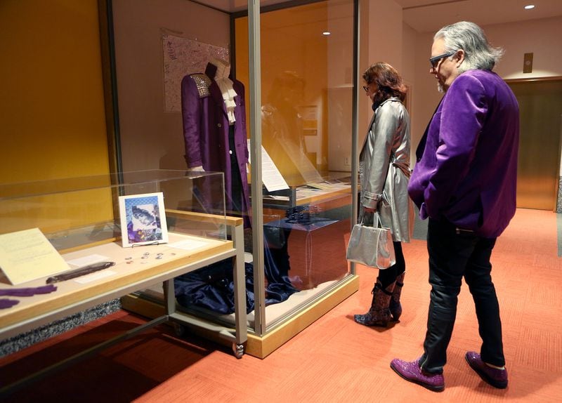  St. Paul residents Jason and Rachel Gorski take a look at a small Prince exhibit at the Minnesota History Center. Photo: RYON HORNE / RHORNE@AJC.COM