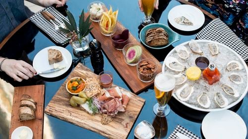 Kick off a foodie weekend in Durham, N.C., with regionally sourced bar snacks and fresh oysters on the expansive rooftop of The Durham Hotel.