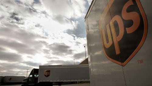 A UPS employee was killed Friday afternoon after a company truck hit him, DeKalb County authorities said.