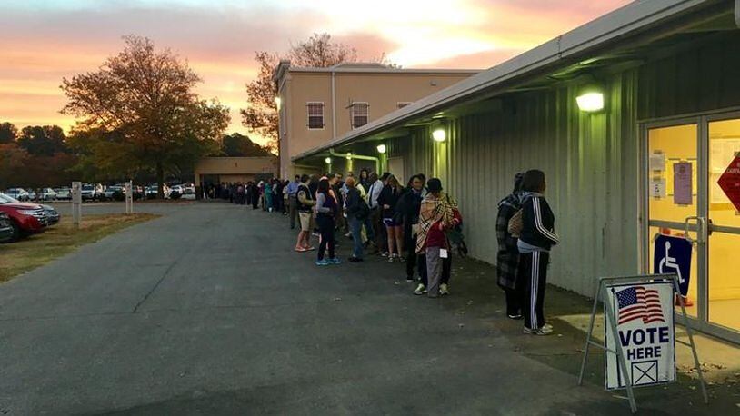 More than 100 people were lined up to vote at the Gwinnett County Fairgrounds in Lawrenceville before polls opened at 7 a.m. CONTRIBUTED