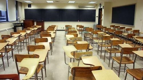 Educators in Cherokee and Forsyth counties must decide such matters as final grades and graduation with no students in class, now that Gov. Brian Kemp has declared all schools closed through the end of the school year. AJC FILE
