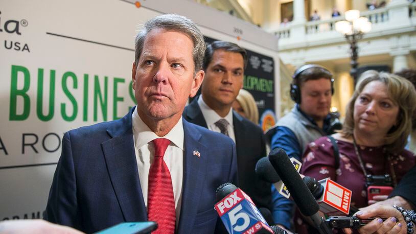 Gov. Brian Kemp answers questions from the media following a press conference in November 2020 to announce a proposed limited expansion of Medicaid in Georgia. (PHOTO by Alyssa Pointer/Atlanta Journal Constitution)
