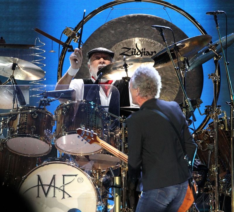 #5 of #22. PLEASE KEEP IN SEQUENTIAL ORDER FOR THE CONTINUITY OF THE GALLERY. -- Drummer Mick Fleetwood. Iconic rockers Fleetwood Mac brought their On With the Show tour to an energized and sold out Philips Arena Wednesday night, December 17, 2014. Touring with Christine McVie for the first time in 16 years, Stevie Nicks, Mick Fleetwood, Lindsey Buckingham and John McVie looked and sounded in exceptional form. Robb D. Cohen/RobbsPhotos.com Mick Fleetwood, despite being ill the night before, didn't miss a beat. Photo: Robb D. Cohen/www.RobbsPhotos.com.