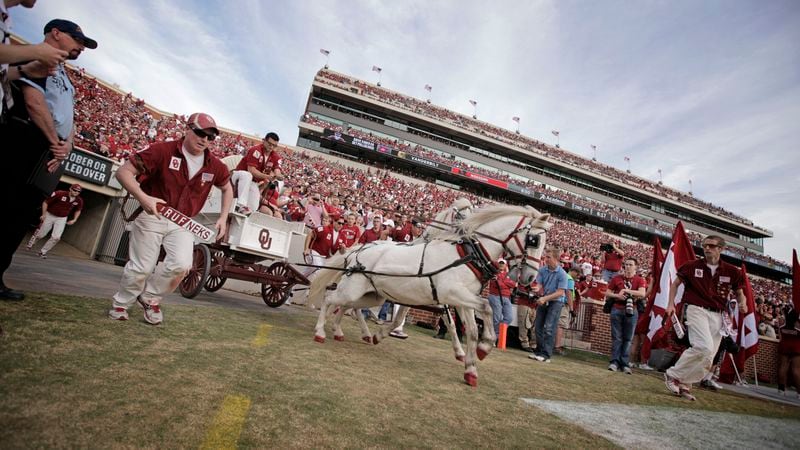 The Sooner Schooner takes the field after an Oklahoma Sooners touchdown at Gaylord Family-Memorial Stadium.