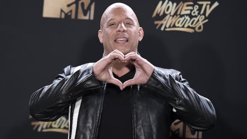Vin Diesel, winner of the Generation award for "The Fast and the Furious", poses in the press room at the MTV Movie and TV Awards at the Shrine Auditorium on Sunday, May 7, 2017, in Los Angeles. (Photo by Richard Shotwell/Invision/AP)