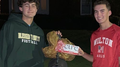 Fighting to cure childhood cancer, brothers Zach and Ryan Snipes, continued their drive from last year and championed this year's gold bow program for CURE childhood cancer raising over $2,000.