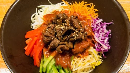 Sutbul bulgogi jaengban guksu combines noodles, vegetables and the traditional beef bulgogi at Dish Korean Cuisine. CONTRIBUTED BY HENRI HOLLIS
