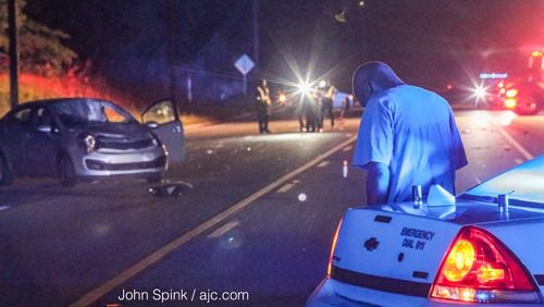 A driver was  detained after striking and killing pedestrian on Jimmy Carter Boulevard. JOHN SPINK / JSPINK@AJC.COM