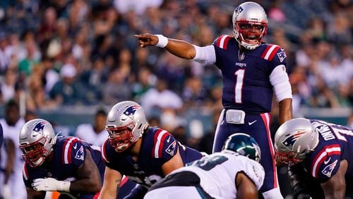 New England Patriots' Cam Newton directs his team during the first half of a preseason game against the Philadelphia Eagles on Thursday, Aug. 19, 2021, in Philadelphia. (Matt Rourke/AP)