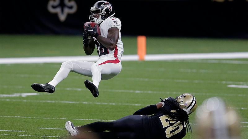 Falcons wide receiver Calvin Ridley (18) pulls in a pass over New Orleans Saints cornerback Janoris Jenkins (20) in the first half Sunday, Nov. 22, 2020, in New Orleans. (Brett Duke/AP)