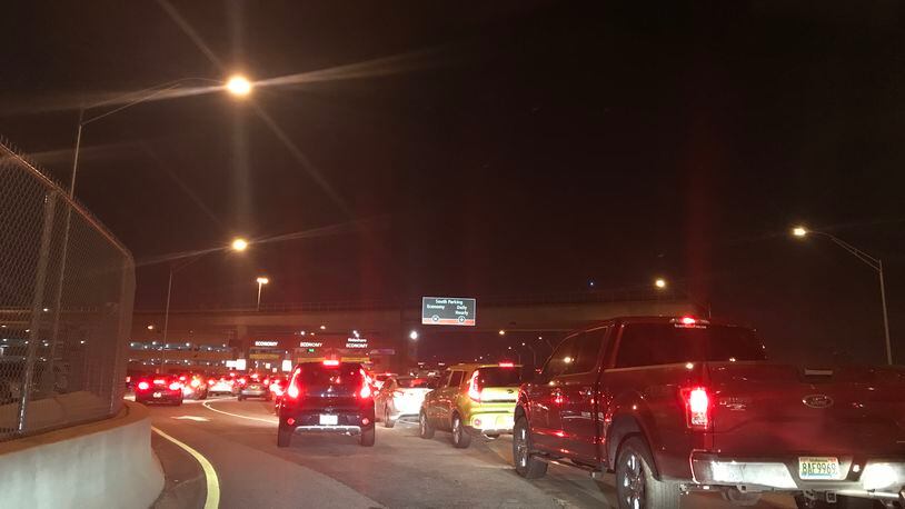 The line of Uber and Lyft drivers at 11:36 p.m. Thursday waiting to enter Hartsfield-Jackson's economy lot to pick up passengers. Credit: Kelly Yamanouchi