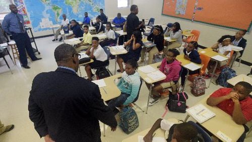 DeKalb County School District Superintendent Steve Green visits with students. AJC FILE PHOTO