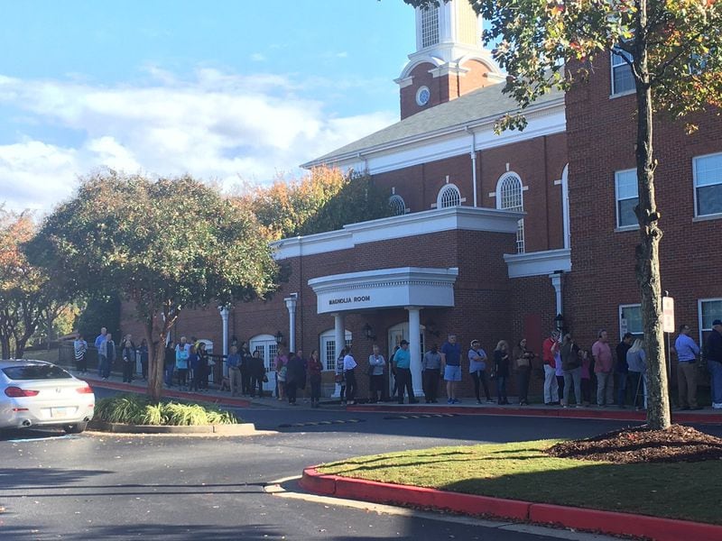 Voters waited in a long line at Johnson Ferry Baptist Church in East Cobb on Tuesday. BEN BRASCH / ben.brasch@coxinc.com