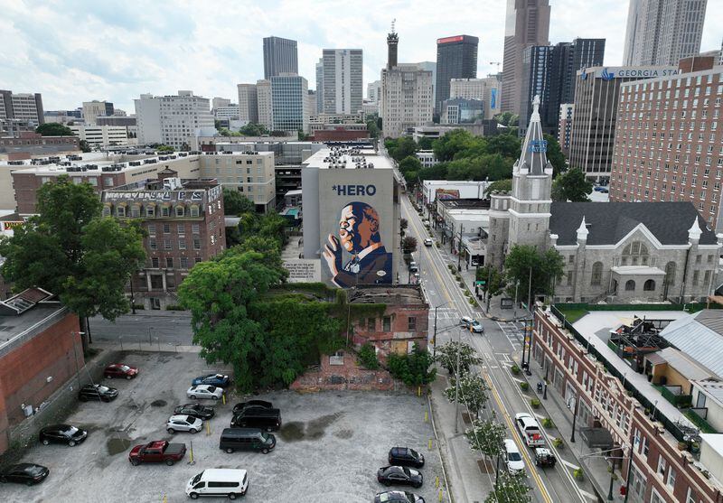 Aerial photograph shows a vacant building (center, foreground) at 229 Auburn Avenue in Atlanta on Wednesday, July 20, 2022. 229 Auburn Avenue is targeted for razing to make way for affordable housing but local preservationists are fighting it, arguing about the buildings historic value. (Hyosub Shin / Hyosub.Shin@ajc.com)