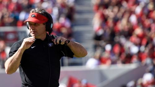 Georgia head coach Kirby Smart directs his team during the annual G-Day game at Sanford Stadium on Saturday, April 16, 2016, in Athens.