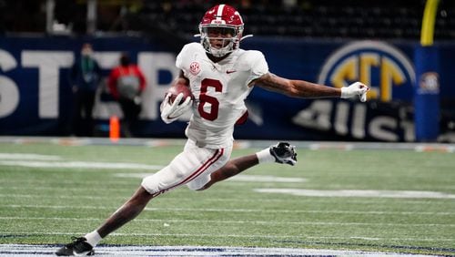 Alabama wide receiver DeVonta Smith (6) runs against Florida during the first half of the Southeastern Conference championship NCAA college football game in Atlanta.  (AP Photo/Brynn Anderson, File)