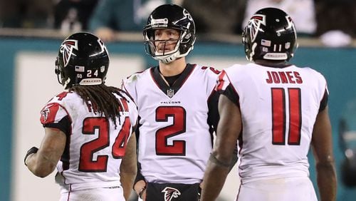 The Falcons’ offense -- led by (from left) Devonta Freeman, Matt Ryan and Julio Jones -- fell far short of expectations this season, which ended in Saturday’s 15-10 playoff loss to the Philadelphia Eagles.
