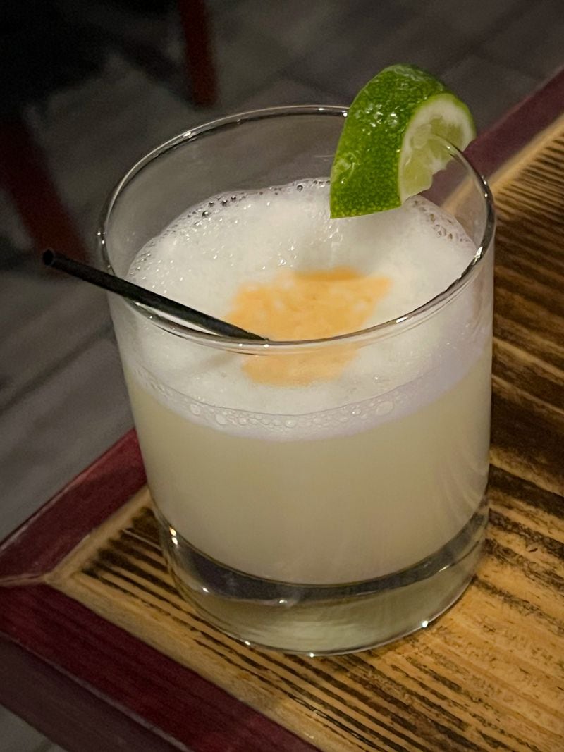 The pisco sour, Peru's best-known cocktail, is available at Pisco Latin Kitchen in Sandy Springs. Henri Hollis/henri.hollis@ajc.com