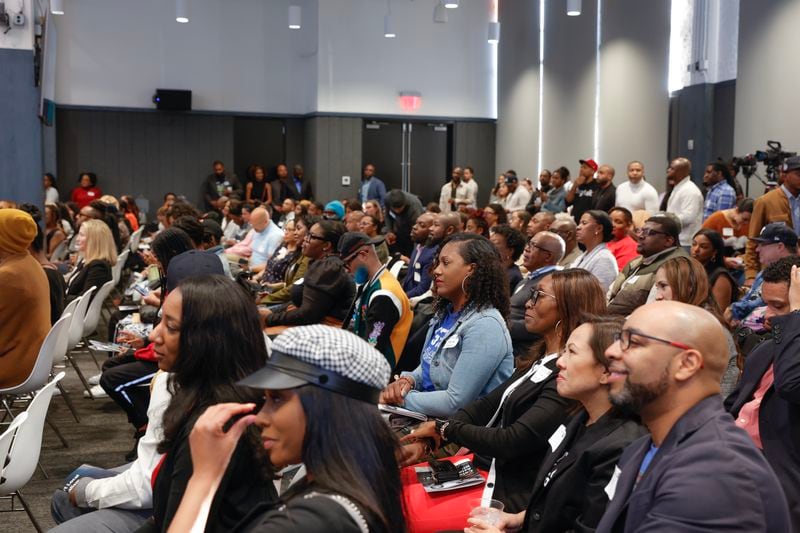 Attendees of The AJC’s Unapologetically Black event at The Gathering Spot look on as Mayor Andre Dickens and other panelists discuss Black culture in Atlanta on Wednesday, March 22, 2023. (Natrice Miller/ natrice.miller@ajc.com)