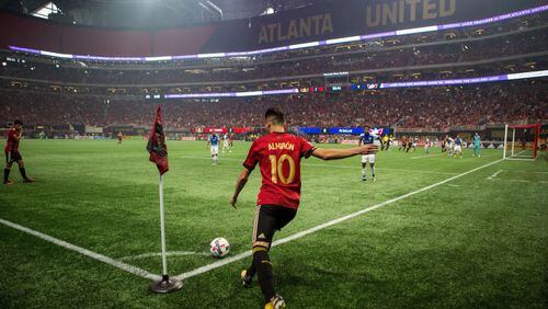 Miguel Almiron unleashes a corner kick during Atlanta United's first game at Mercedes-Benz Stadium Sunday, Sept. 10, 2017, against FC Dallas in Atlanta.