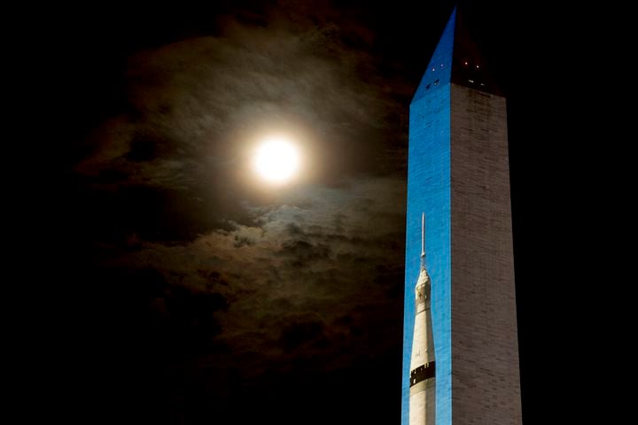 Photos: Apollo 11 Saturn V rocket lights up Washington Monument
