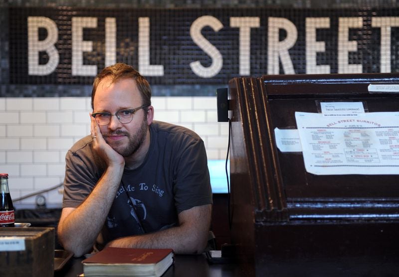 Matt Hinton, owner of Bell Street Burritos, at his stall in the Sweet Auburn Curb Market in 2011. / AJC file photo