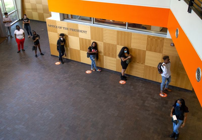 Clayton State University students line up to get their IDs on the first day students returned to school Monday, Aug. 10, 2020.  STEVE SCHAEFER FOR THE ATLANTA JOURNAL-CONSTITUTION