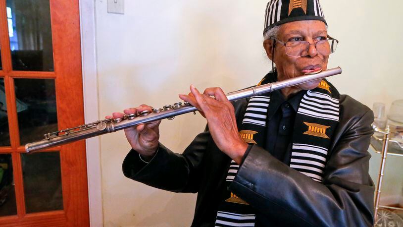 James Patterson plays his flute in his home in Atlanta on Friday, July 2, 2021. Patterson is a longtime jazz musician as well as an associate music professor at Clark Atlanta University. (Christine Tannous / christine.tannous@ajc.com)