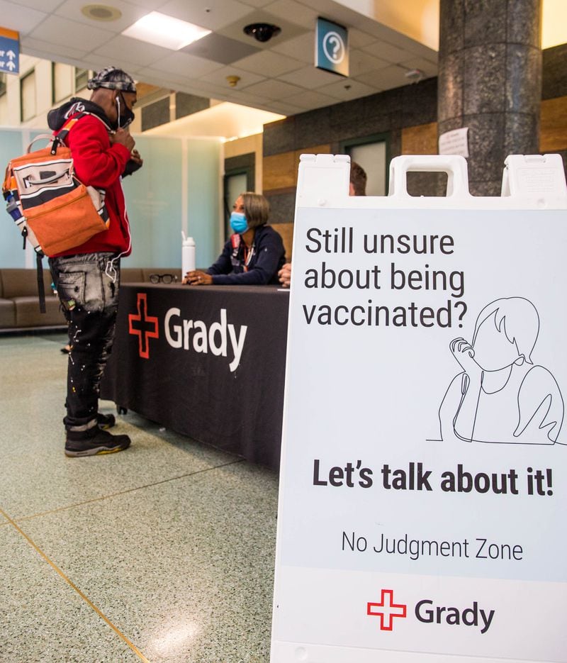 Emory professor Dr. Kimberly Manning runs a 'no judgement zone' at Grady Hospital last October to talk to anyone with questions or concerns about COVID vaccinations. More than a year after the vaccine arrived, Georgia health officials are straining to convince the unvaccinated to take the shots. (Jenni Girtman for The Atlanta Journal-Constitution)