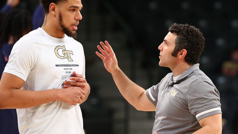 Georgia Tech coach Josh Pastner (right) has four scholarships available, but he won’t give them away just for the sake of it. (Curtis Compton / Curtis.Compton@ajc.com)