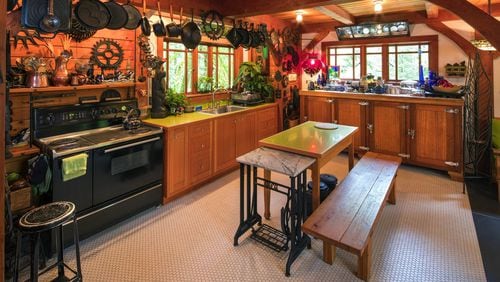 Daucey and Pat Brewington’s home outside North Bend features a mahogany fixture (far end of the kitchen under the window) in the kitchen, which is an old beer cooler from a defunct Queen Anne Hotel. (Mike Siegel/Seattle Times/TNS)