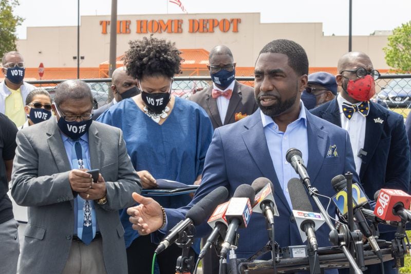 The Rev. Lee May, pastor of Transforming Faith Church, speaks during a press conference to announce a boycott of Home Depot over inaction on recent voting legislation in Georgia, across from a Home Depot in Decatur, Ga. on April 20th, 2021. PHOTO BY NATHAN POSNER